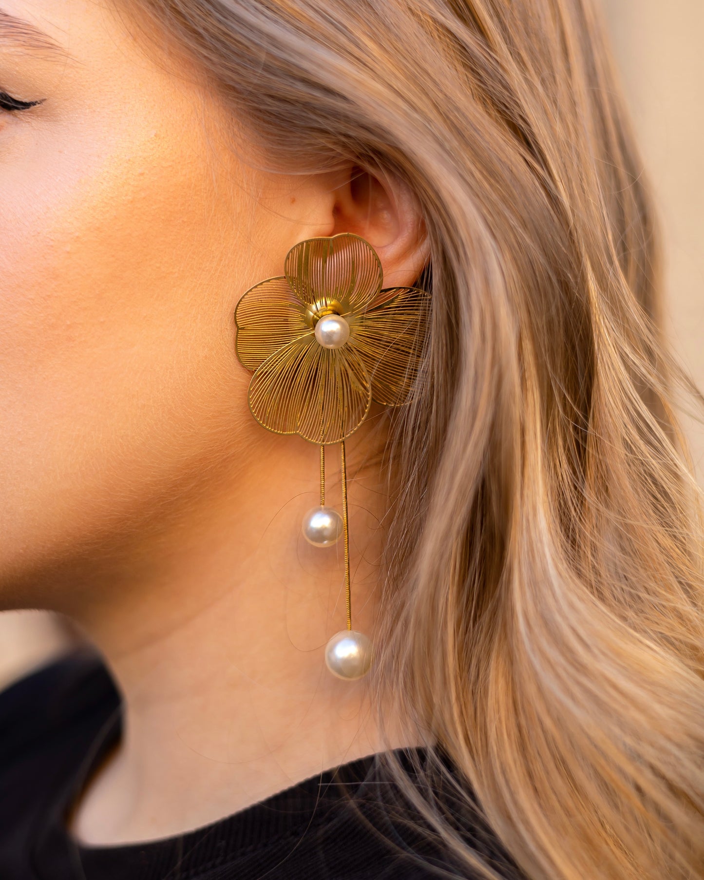 Statement gold flower earrings with pearls for women