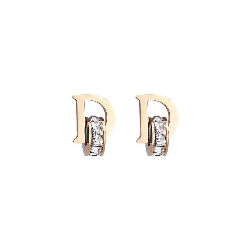 Diva 18K gold-plated D-shaped zircon stud earrings for women – statement style by CELOSIA