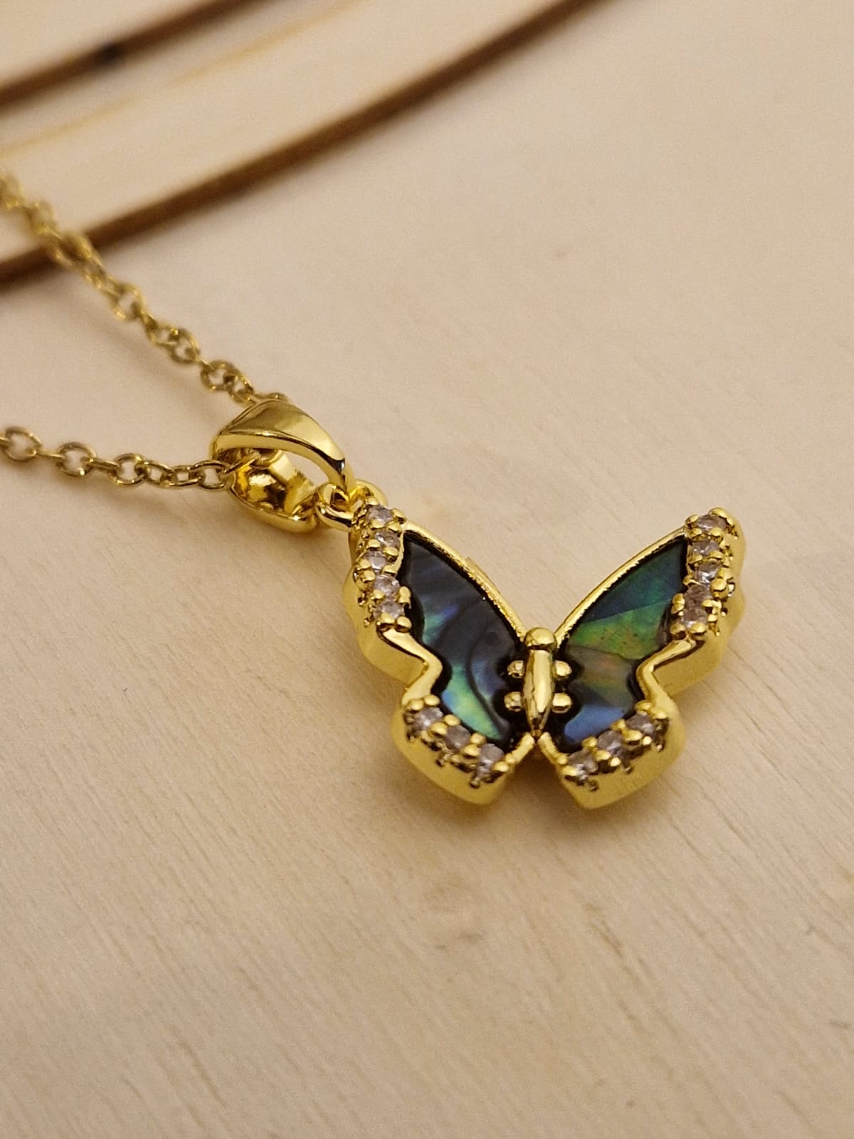 Xenobia butterfly pendant necklace with zircon stones