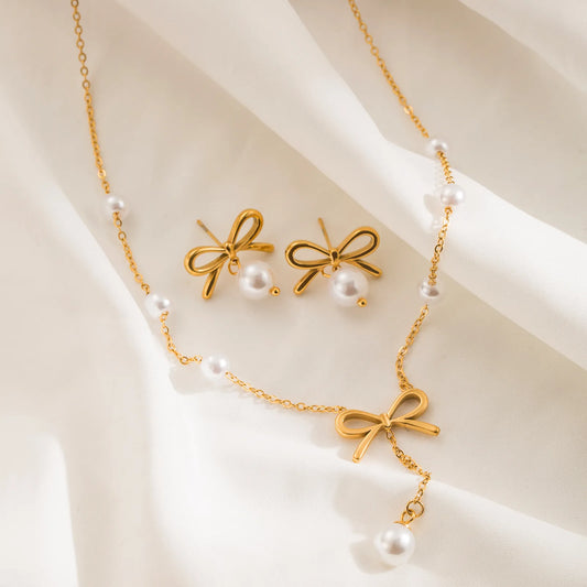 Aurora gold-plated bow pearl necklace and earrings set